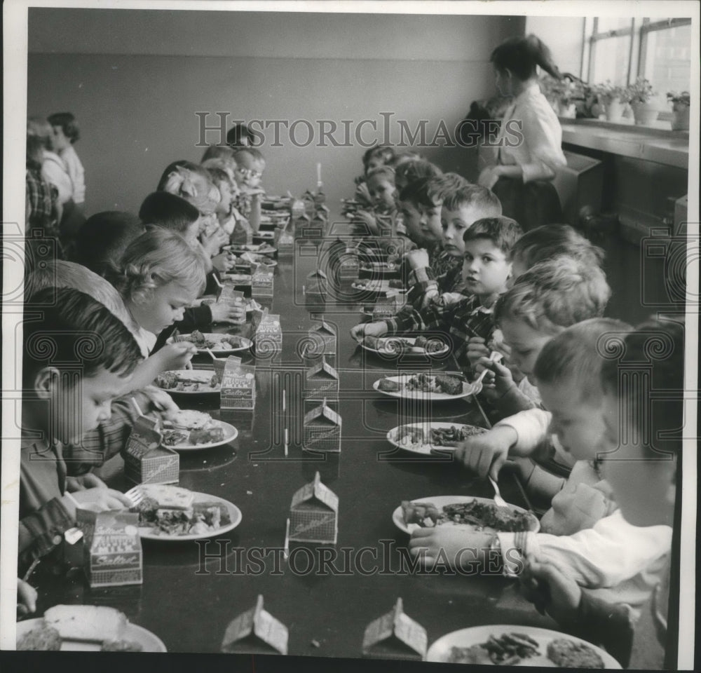 1957 81st Street School, pupils eating from pre-filled plates.-Historic Images