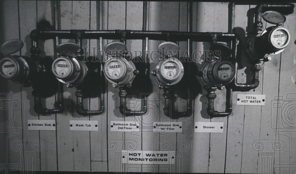 1977 Press Photo energy saving hot water meters installed in house - mjb01629 - Historic Images