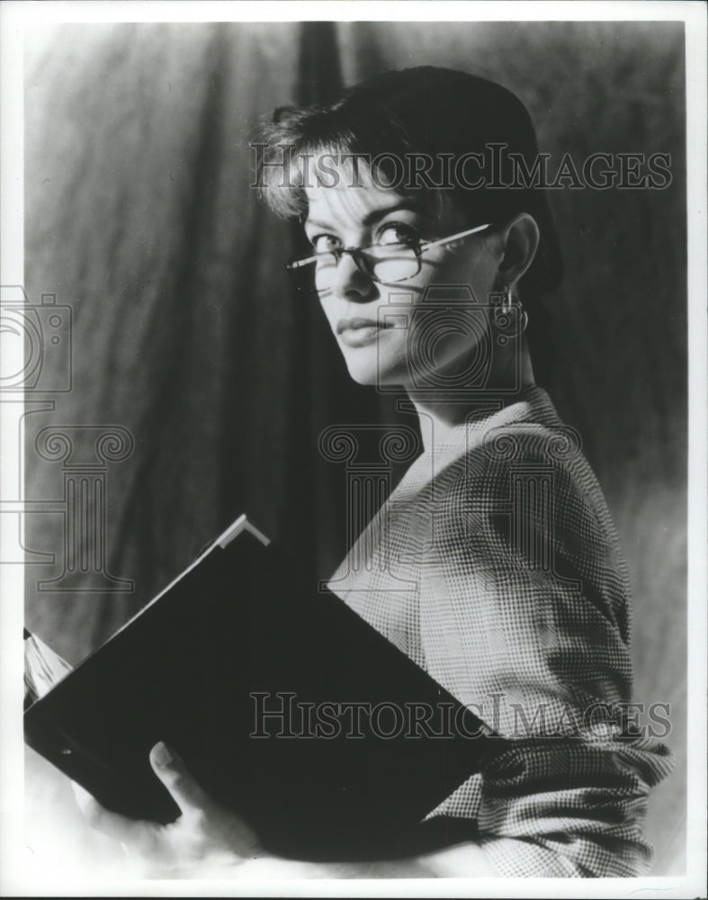 1990 Press Photo Reading glasses can give a more demure look - mjb02259 - Historic Images