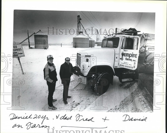 1983 Press Photo Daniel, Fred, and David Reid on their Plainfield farm - Historic Images