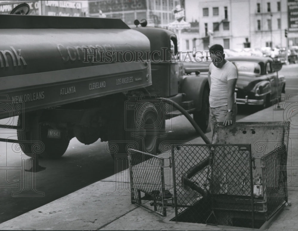 1954 Press Photo Ink is transferred from a truck to Milwaukee Journal building-Historic Images