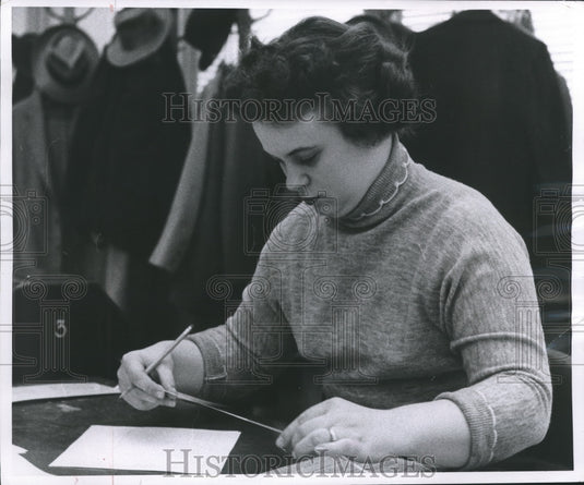 1955 Press Photo Audrey Seal receives the stock quotations. - mjb04472 - Historic Images