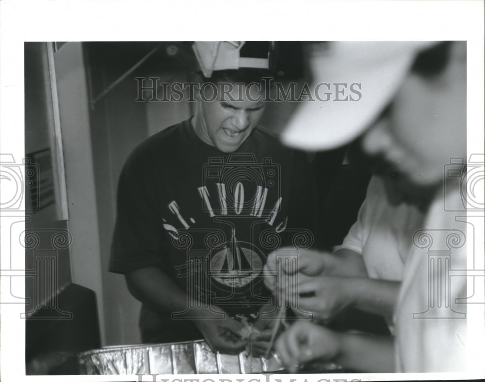 1994 John Germano cleaning squid for cioppino at Festa Italiana-Historic Images