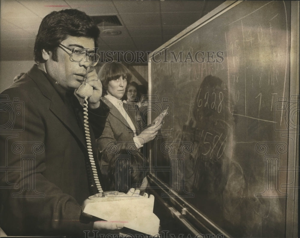 1979 Press Photo Judge Ness Flores with Wife Phylis Going Over Election Returns - Historic Images