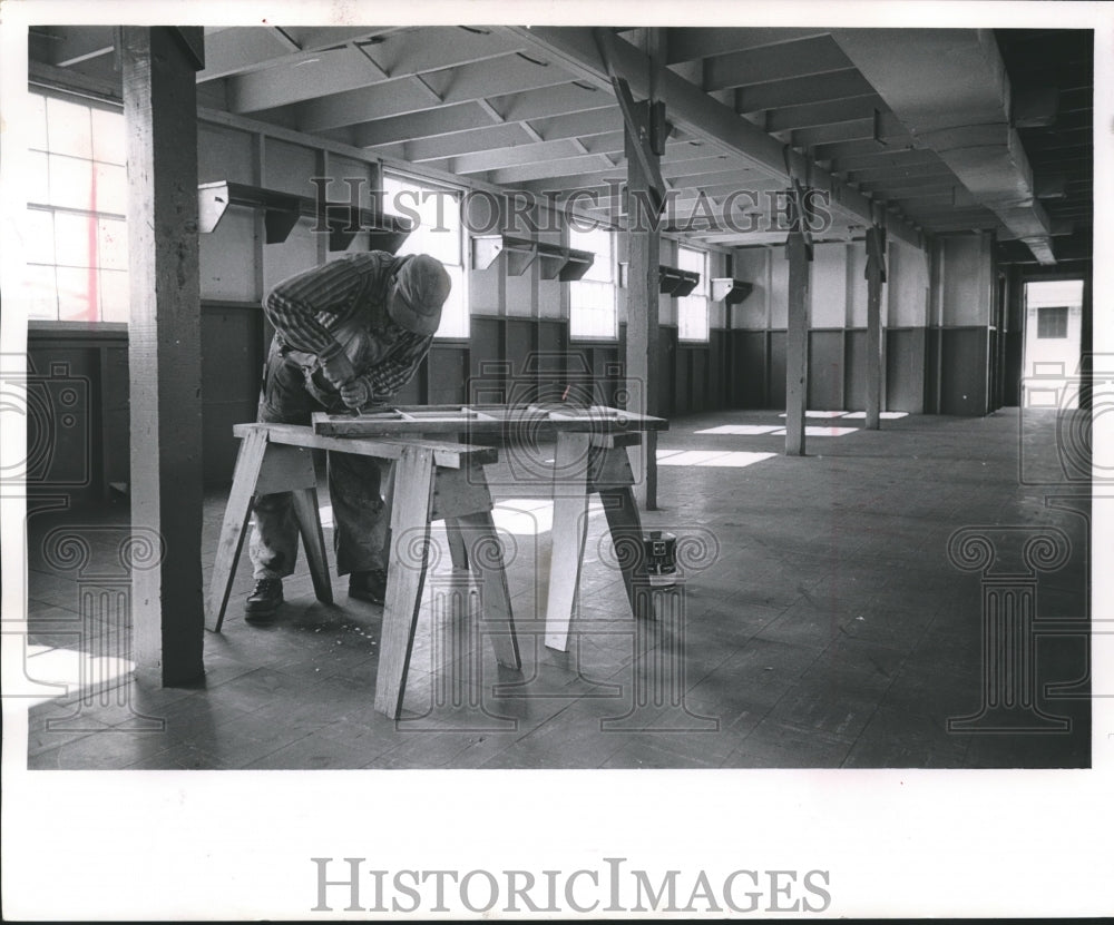 1961 Worker repairs barracks in Fort Lewis for Wisconsin guard-Historic Images
