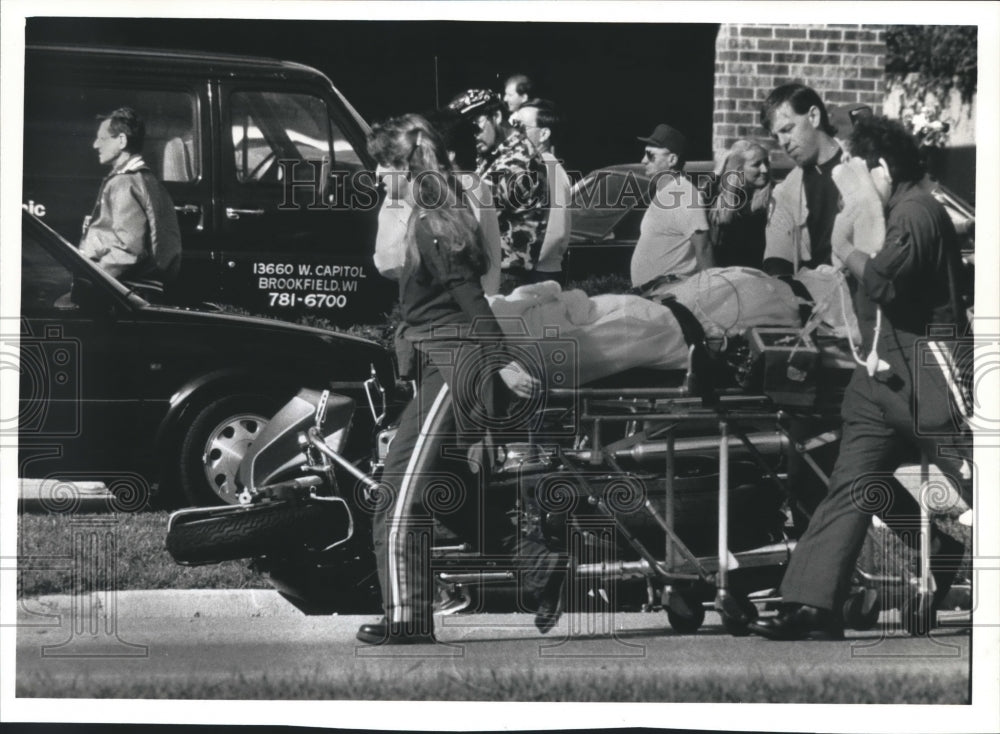 1991 Press Photo Man Rushed to Flight for Life Helicopter After Motorcycle Crash - Historic Images