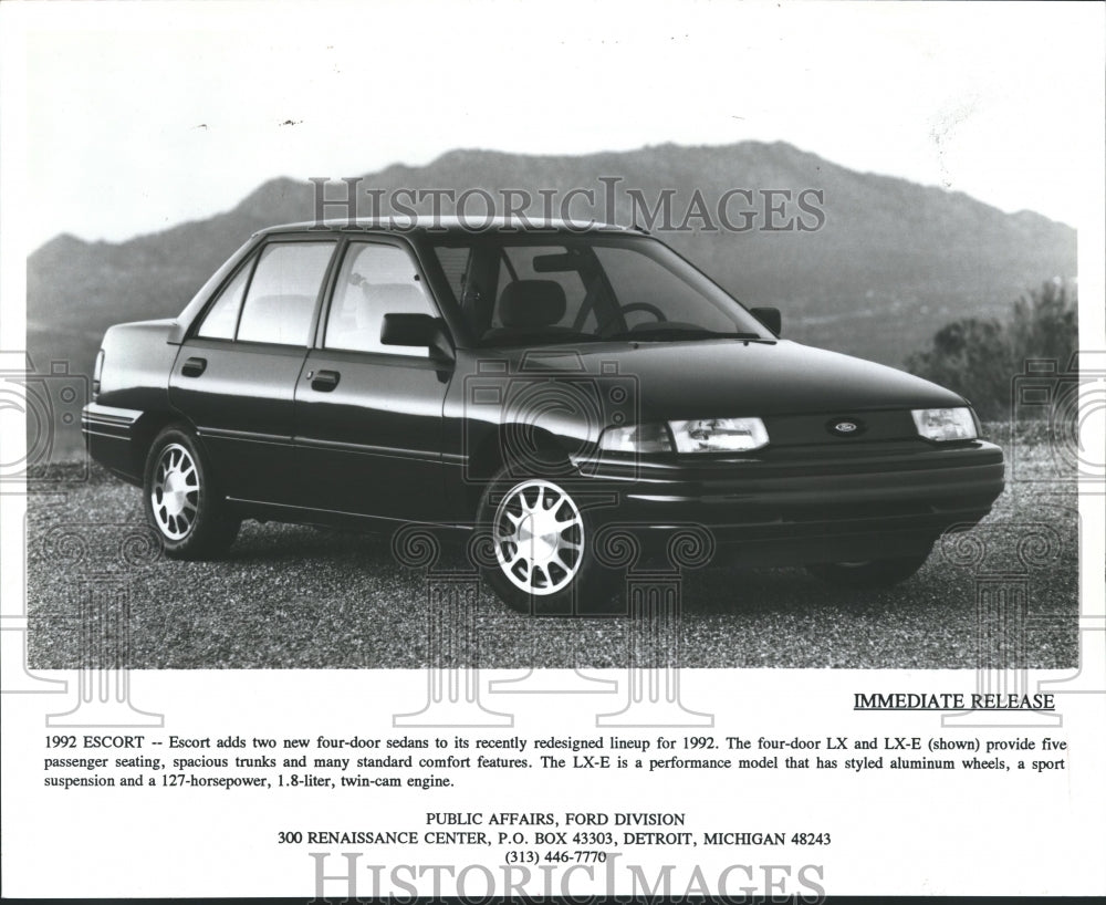 1991 Press Photo Front Passenger Side View of Ford Escort LX-E Four Door Sedan - Historic Images