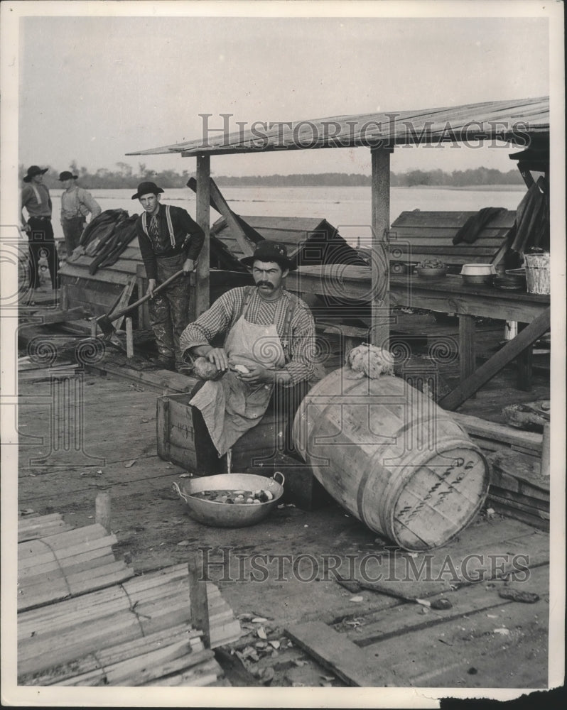 1951 Press Photo Cook preparing Food on Pier for Loggers - mjb14683 - Historic Images