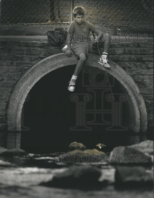 1991 Press Photo Joshua Peterson Fishing at Frame Park in Waukesha After School - Historic Images