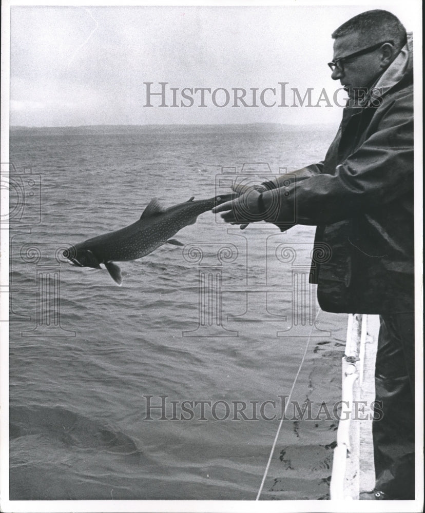 1965 Hacker Releases a Tagged Trout into Big Green Lake-Historic Images