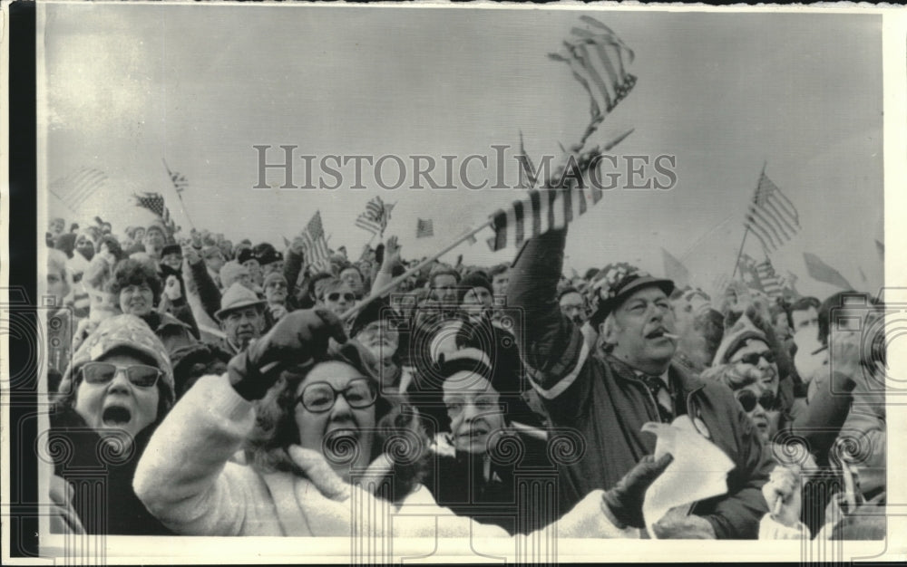 1976 Ed Holum of Illinois Waves American Flags at the 1976 Olympics - Historic Images