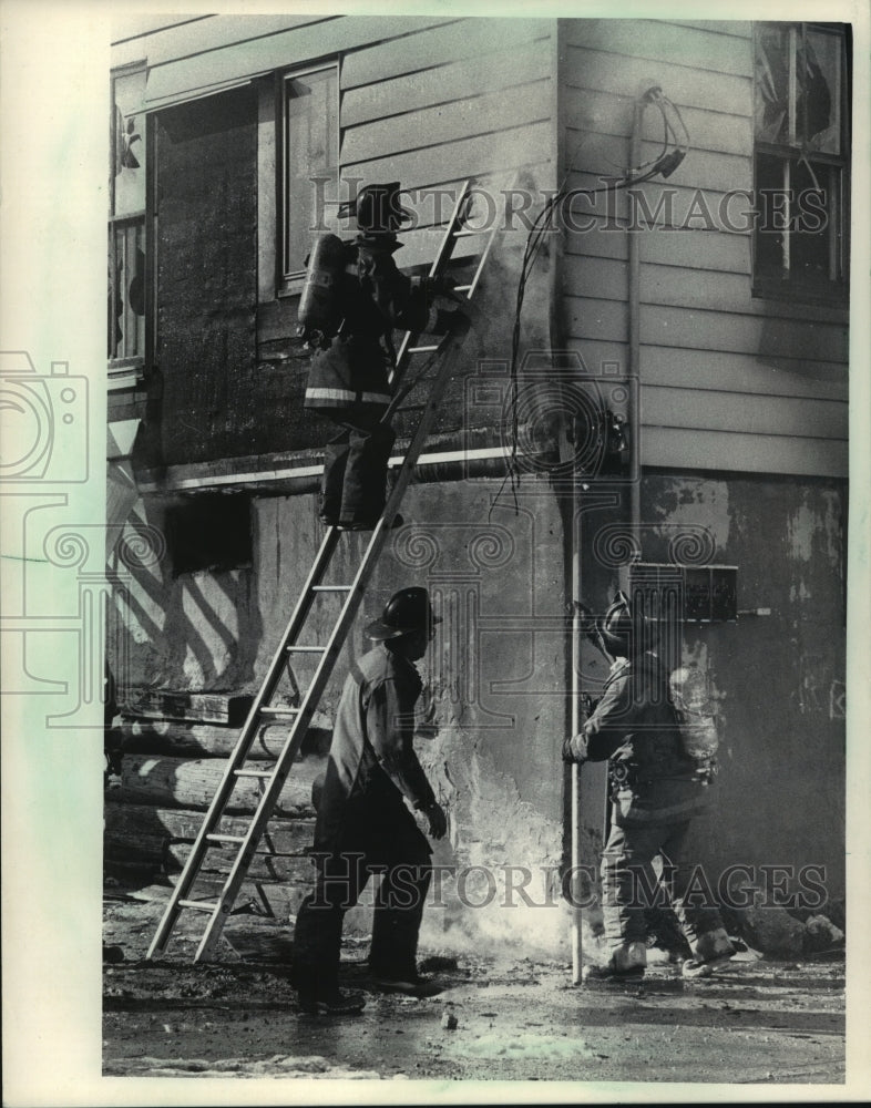 1985 Firemen work on a House fire in Milwaukee, Wisconsin-Historic Images