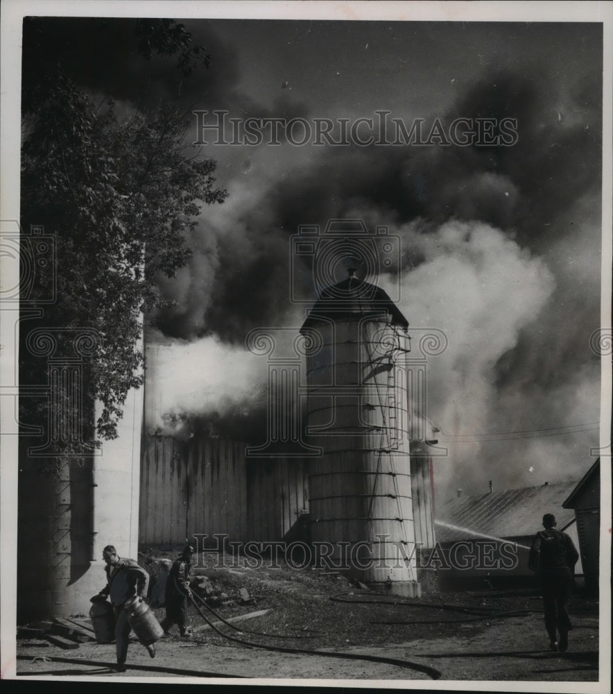 Press Photo Firefighters Fight Barn Fire at Arland Page Farm East of Ripon - Historic Images