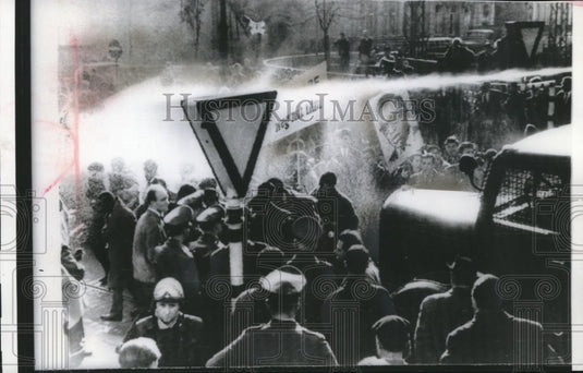 1961 Press Photo Water streamed over African students during protest, Germany-Historic Images
