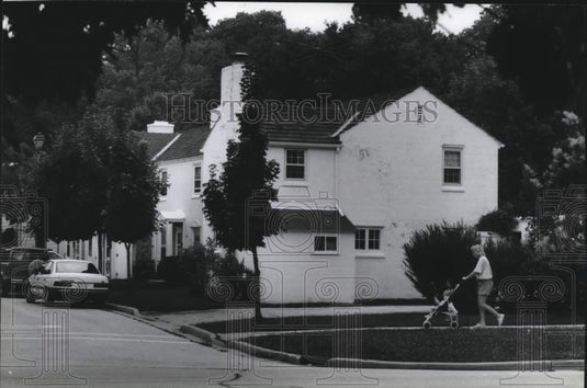 1994 Press Photo Women walking baby in stroller, Greendale, Wisconsin area. - Historic Images