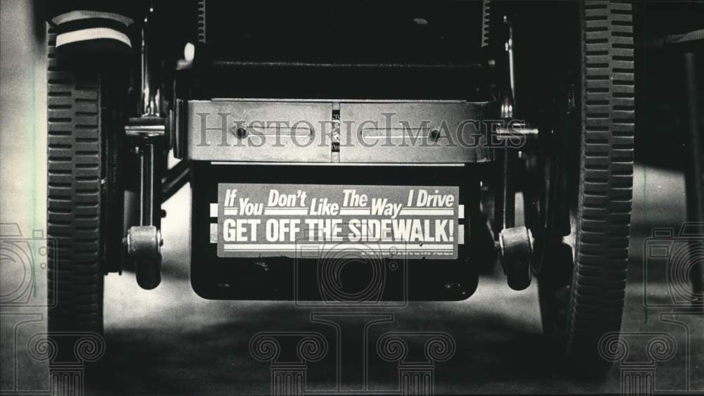 1988 Press Photo Bumper Sticker on Wheelchair in Greenfield, Wisconsin - Historic Images