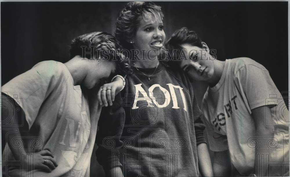 1986 Press Photo Pompon girls exhausted after practice, Waukesha High School, WI - Historic Images