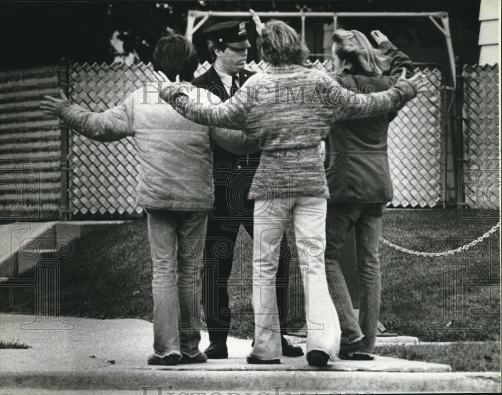 1979 Policeman Searches Students After Fight At Madison High School-Historic Images