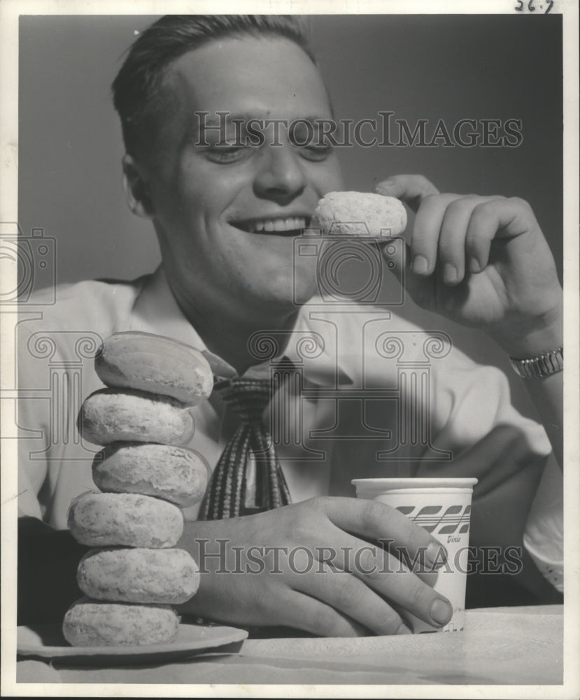 1951 Press Photo Cliff George Blood Donor Enjoying Snacks - mjb28119-Historic Images