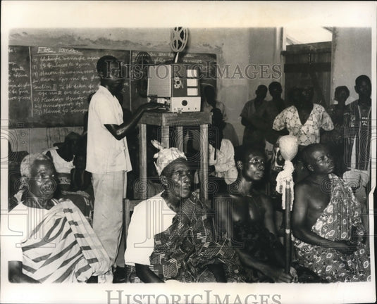1962 Press Photo Togbe Gbogb village chief, watches United Nations film, Ghana. - Historic Images