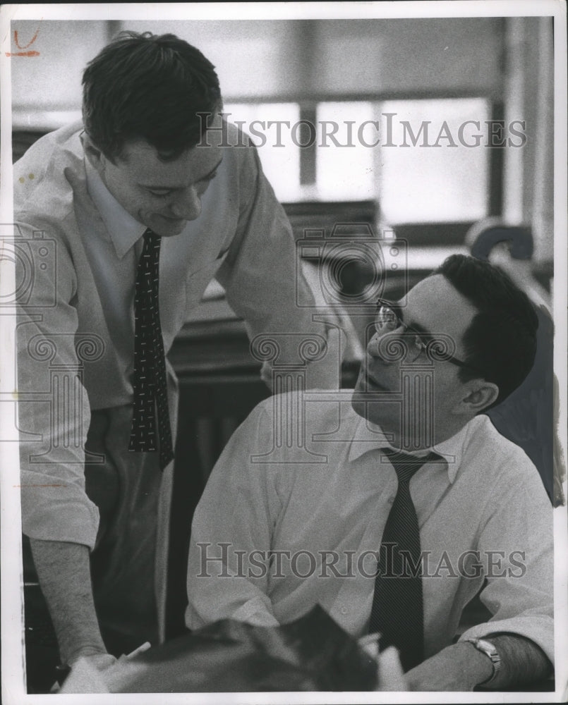 1955 Press Photo David Wiggins and Emil Schneider are part of the News Staff. - Historic Images