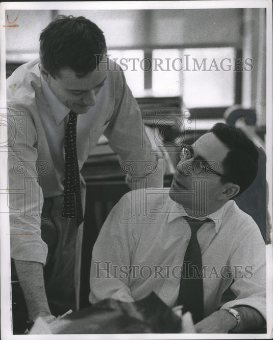 1955 Press Photo David Wiggins and Emil Schneider are part of the News Staff. - Historic Images
