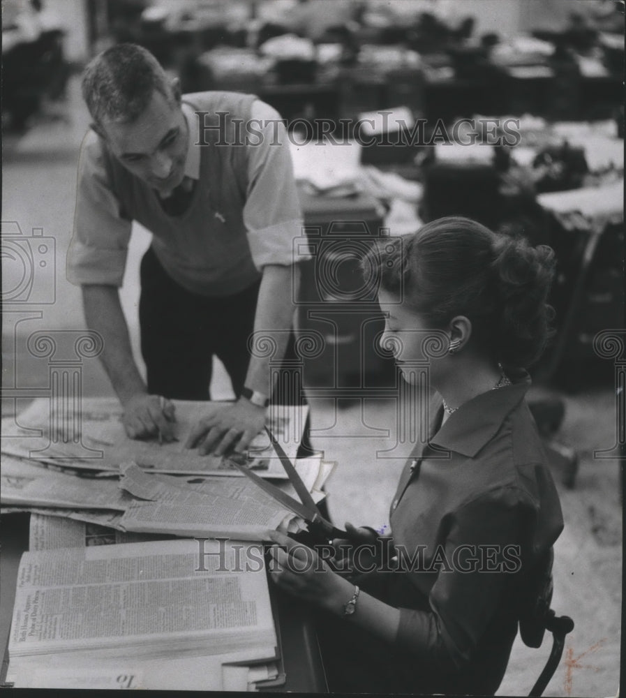 1955 Press Photo Jean Lippert and Miles McNamara work at the Milwaukee Journal. - Historic Images