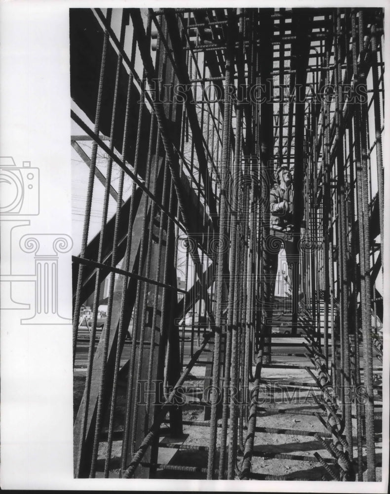 1965 Melvin Cotts, works amid the steel rods of a pier, Milwaukee.-Historic Images