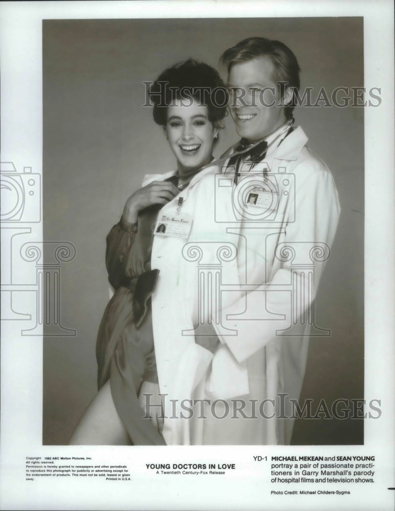 1982 Press Photo Michael McKean and Sean Young portray &quot;Young Doctors in Love&quot; - Historic Images
