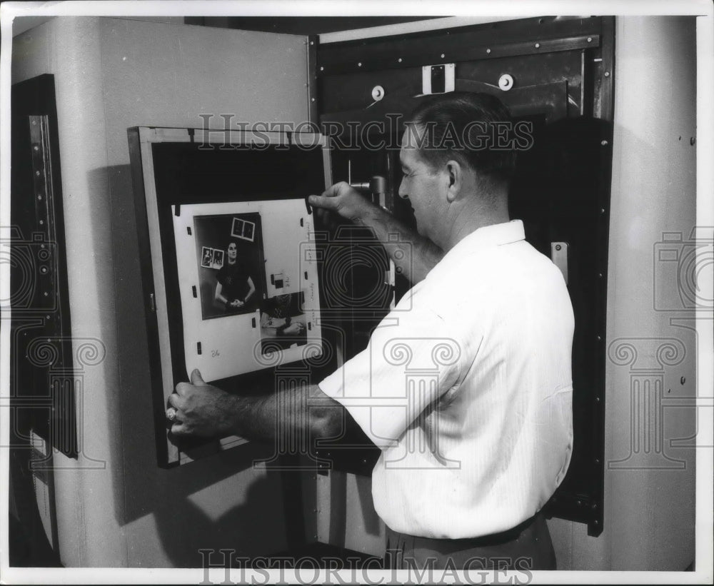 1966 Press Photo Man Hanging up Poster Milwaukee Journal Art Department - Historic Images