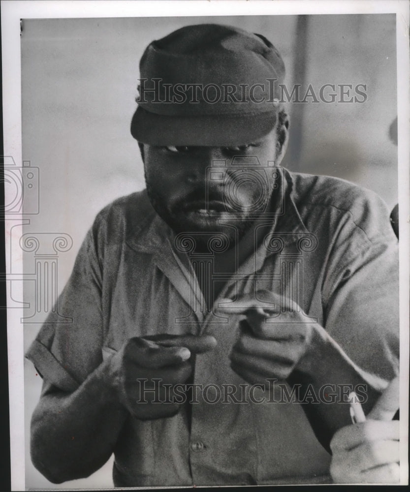 1966 Press Photo Gesturing graphically, a Haitian who fled to Dominican Republic - Historic Images