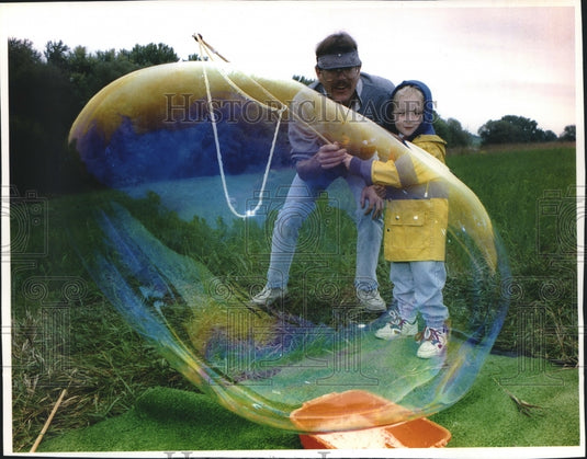 1993 Press Photo Child blows bubble at 7th Annual Apple Harvest Festival - Historic Images