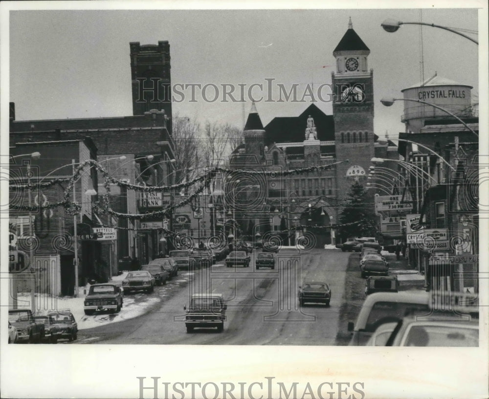 1975 Press Photo Downtown Crystal Falls, Michigan is considered for Project ELF - Historic Images