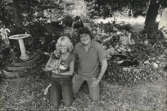 1981 Press Photo Tom & Barb Mihalko with dog in their Backyard Wildlife Habitat. - Historic Images