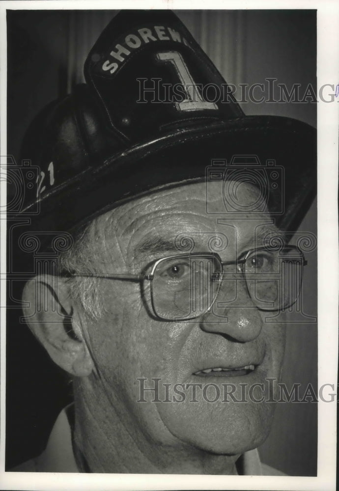 1992 Marv Rosin wearing retired Shorewood Fire Department helmet-Historic Images