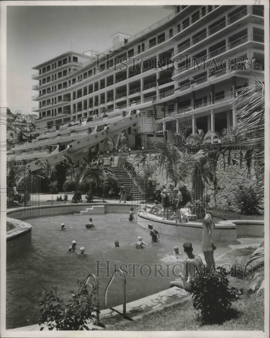 1952 Swimmers at Luxury hotel Pacific resort pool, Acapulco, Mexico.-Historic Images