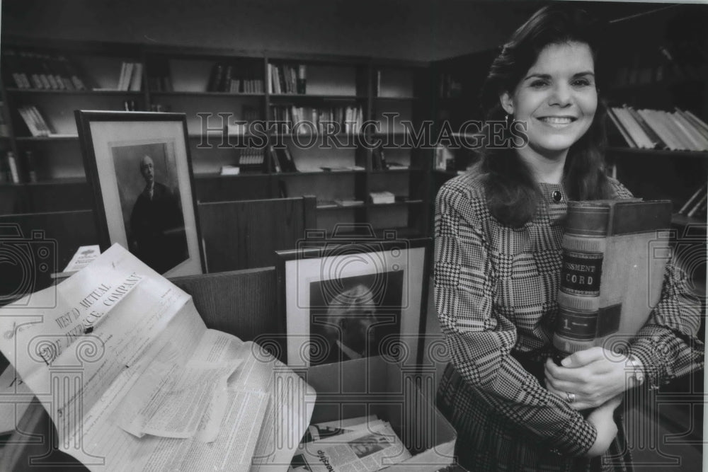1994 Janet Ellen Raasch in the library of West Bend Insurance Co.-Historic Images