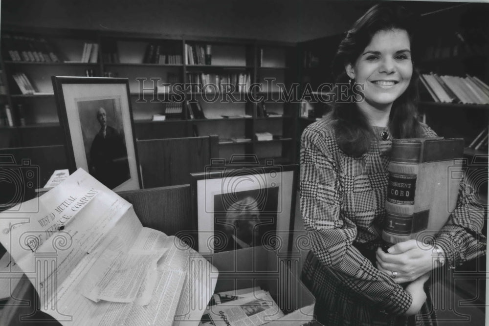 1994 Janet Ellen Raasch in the library of West Bend Insurance Co ...