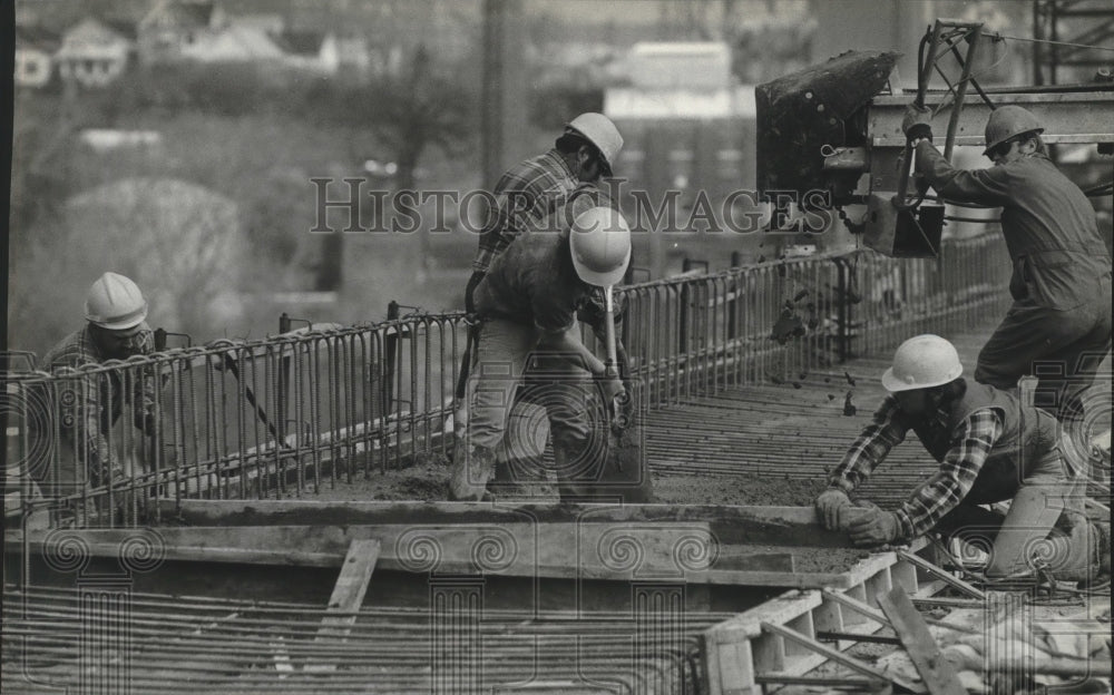 Press Photo Workman finished concrete for the bridge in Milwaukee. - mjb46238 - Historic Images