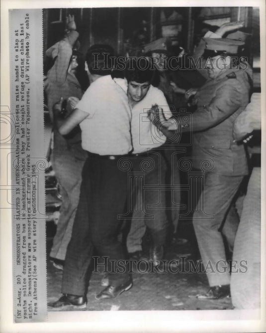 1965 Press Photo Athens Policemen Slap Young Demonstrators, Greece - mjb46809-Historic Images