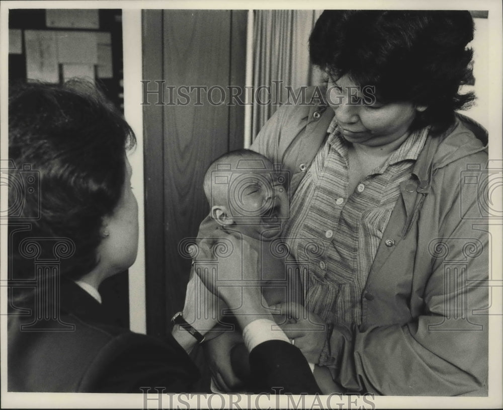 1983 Press Photo Melissa Ortiz gets shot, Milwaukee Health Department - Historic Images