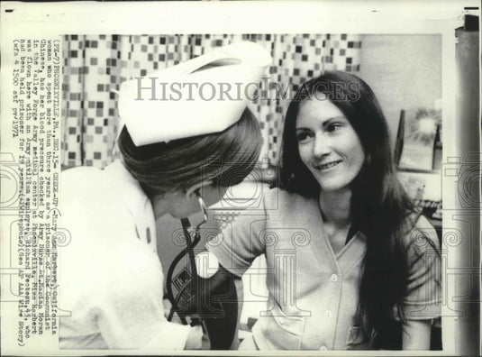 1971 Press Photo A nurse checks Mary Ann Harbert's blood pressure, Pennsylvania-Historic Images