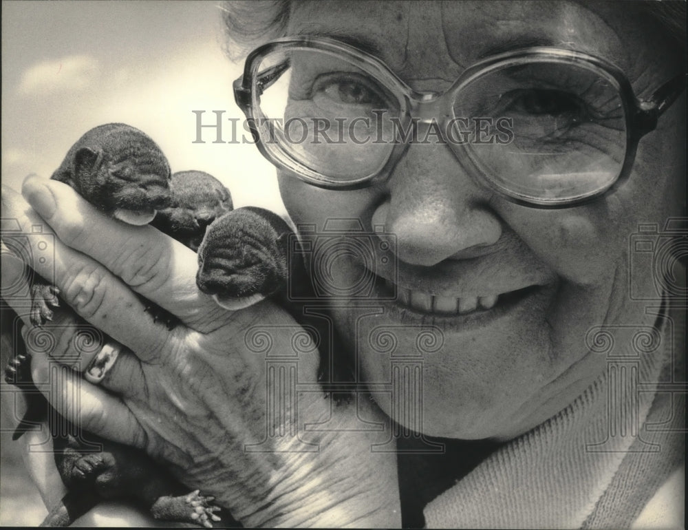 1984 Mary Cooper with three mink kits-Poor Paul&#39;s Place, Mukwonago-Historic Images