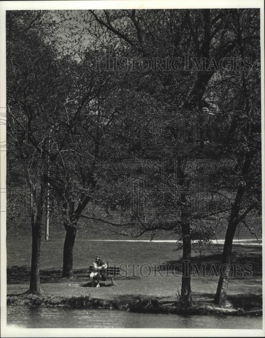 1991 Couple enjoy budding trees at Mitchell Park, Milwaukee-Historic Images