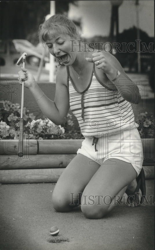 1982 Laura Storm Playing Miniature Golf-Historic Images