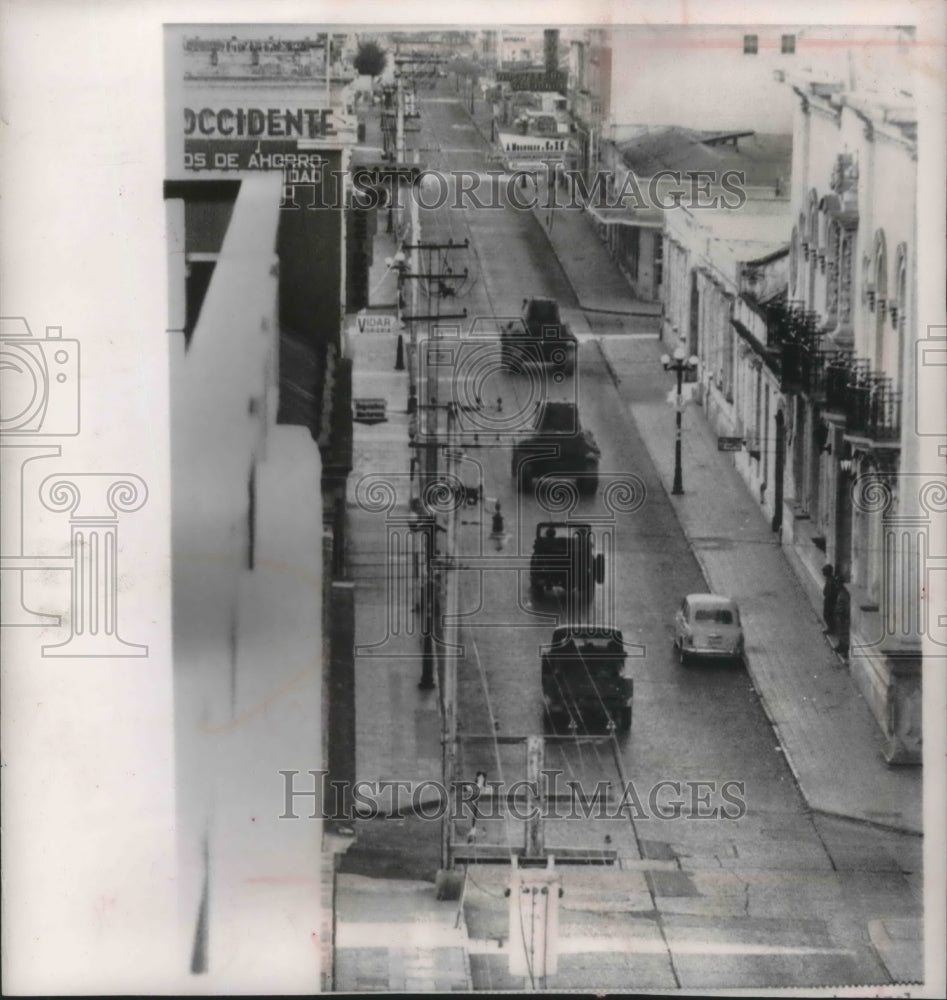 1963 Press Photo Military vehicles patrol deserted street in downtown Guatemala - Historic Images