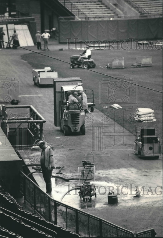 1986 Workers cleaning up and repairing field at Stadium, Milwaukee.-Historic Images