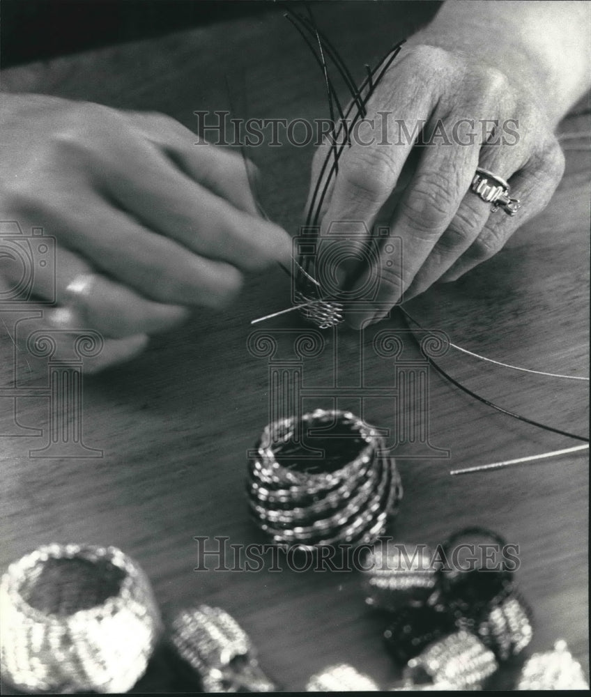 1991 Susan Monde of Milwaukee making baskets for jewelry.-Historic Images