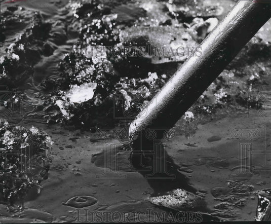 1975 Closeup View Of Oil Being Pumped Into Tank Trucks-Historic Images