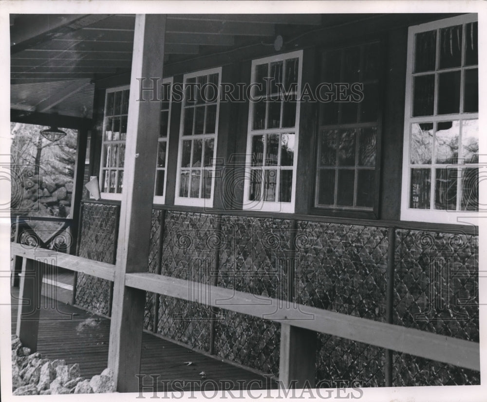 1954 Press Photo Wooden porch giving protection to a House made of newspaper - Historic Images